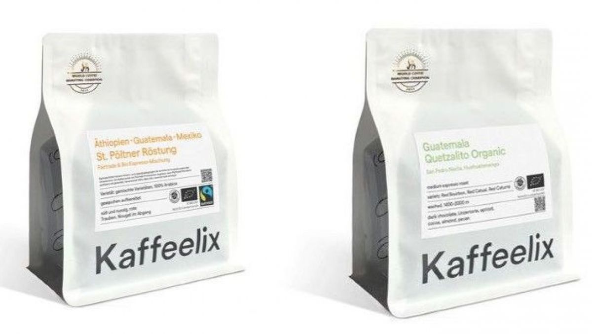 Zwei Packungen Kaffee von Kaffeelix unterschiedlicher Sorten. 